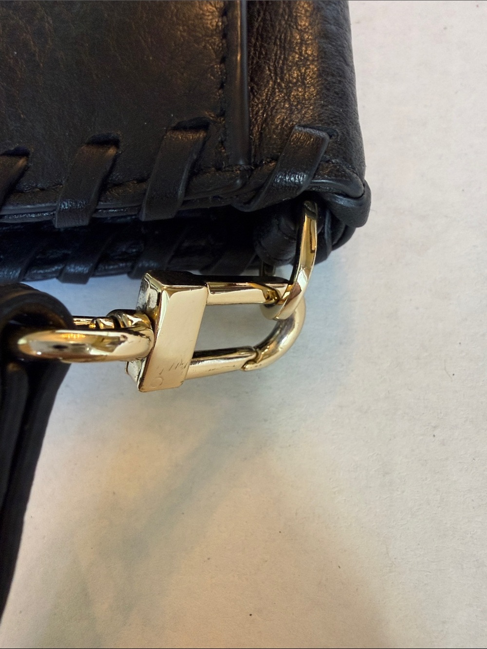 Tory Burch Black Pebbled Leather Wristlet with Logo Medallion - Picture 3 of 10